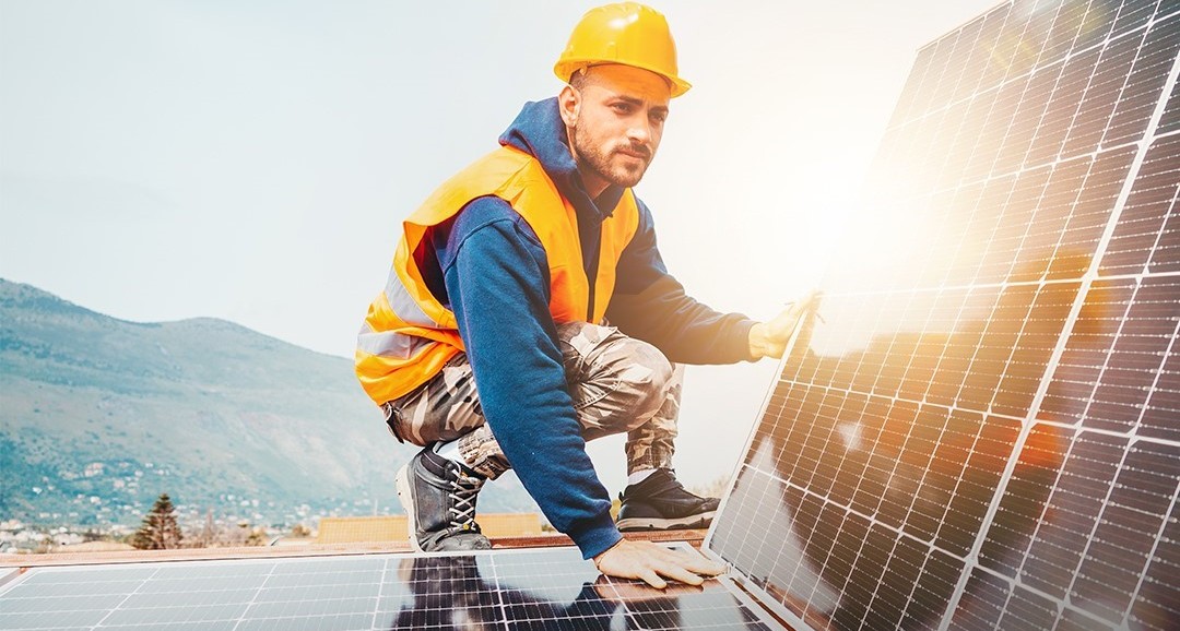 AKLease working on solar panel.jpg