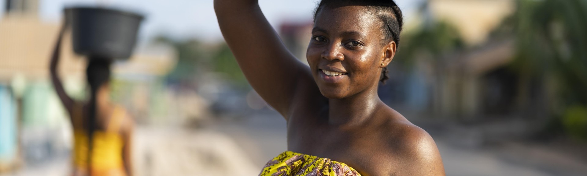 thumbnail_beautiful-african-women-fetching-water-from-outside.jpg